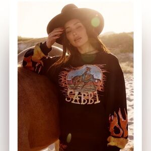 SABBI flaming cowboy jumper. Size small. Color black
